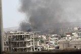 Smoking buildings in Daraya, Syria