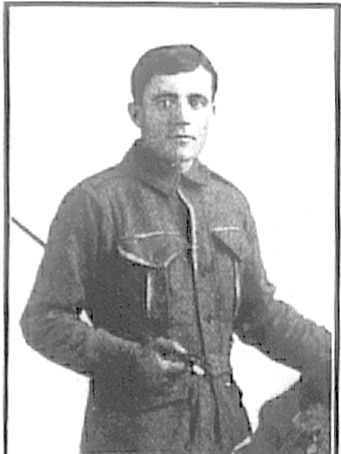 A black-and-white photo of a man in a world war one uniform