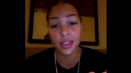 A selfie view of Liz Cambage's face as she records a video