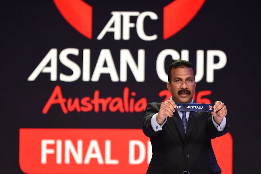 AFC general secretary Dato' Alex Soosay draws Australia into Group A for the 2015 Asian Cup.