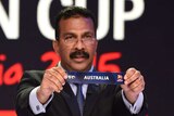 AFC general secretary Dato' Alex Soosay draws Australia into Group A for the 2015 Asian Cup.