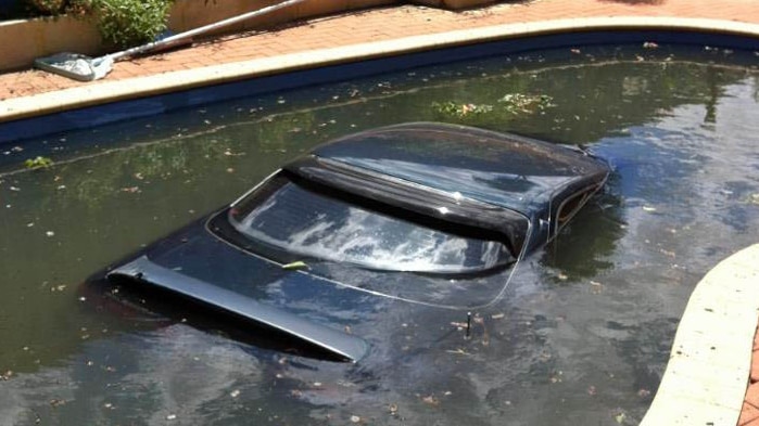 Car stuck in pool