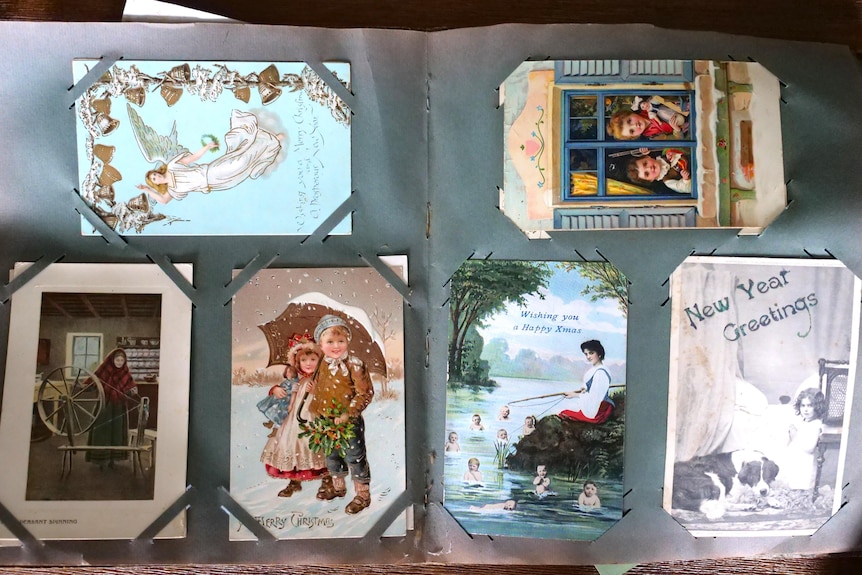 Old postcards in an album 