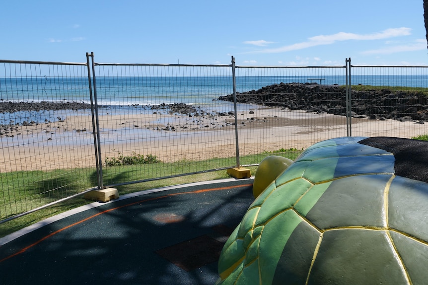 A photo from standing on the Bargara Turtle Playground shows it's proximity to the beach, about five metres to the sand.
