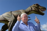 Clive Palmer in front of Jeff the dinosaur at his Coolum Palmer resort in 2012.