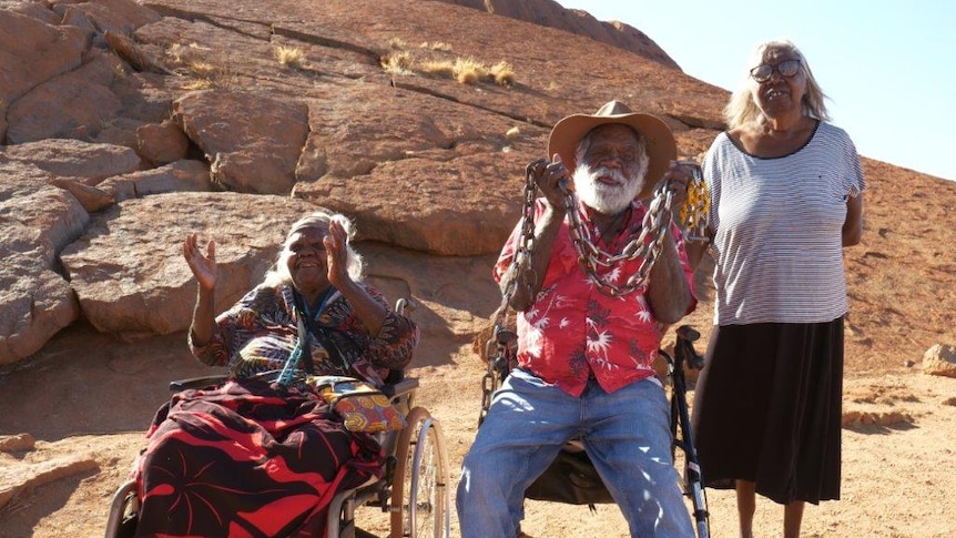 Aboriginal elders watched from the base of Uluru as the last chain was brought down