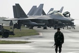 USAF F-22 Raptor fighters parked on the tarmac on Okinawa