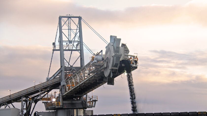 Coal coming off a conveyer belt at a mine