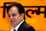 A close up photo of Dilip Kumar smiling in 2008.