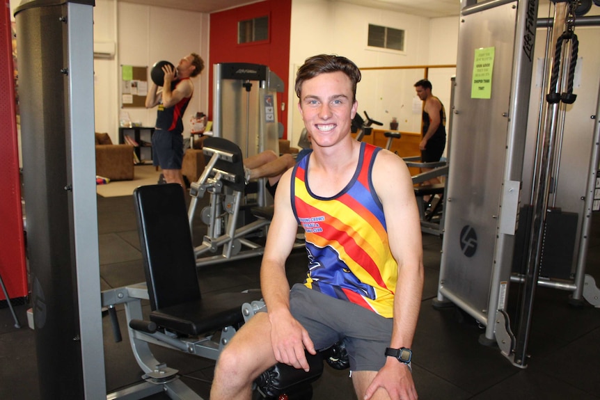 George Sandral, 17, has started a group fitness called Fit Farmer.
