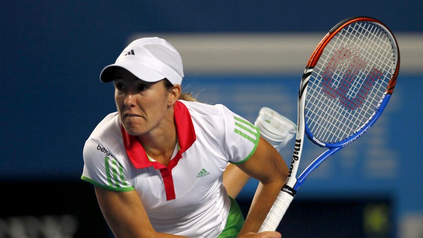 Justine Henin found herself down a set before recovering to see off a spirited Mirza.