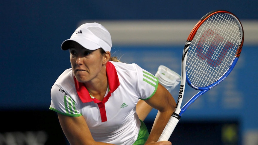 Justine Henin found herself down a set before recovering to see off a spirited Mirza.