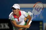 Justine Henin found herself down a set before recovering to see off a spirited Mirza.