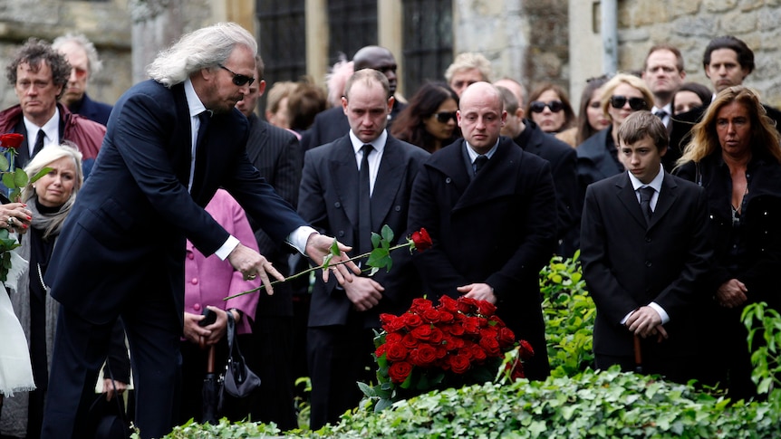 Barry Gibb pays tribute at his brother's funeral