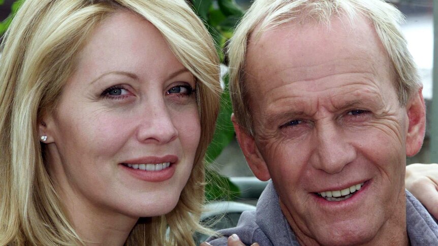 A close up photo of Paul Hogan and his wife Linda Kozlowski in 2001