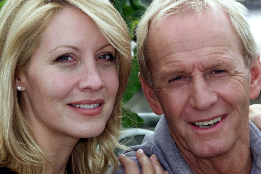 A close up photo of Paul Hogan and his wife Linda Kozlowski in 2001