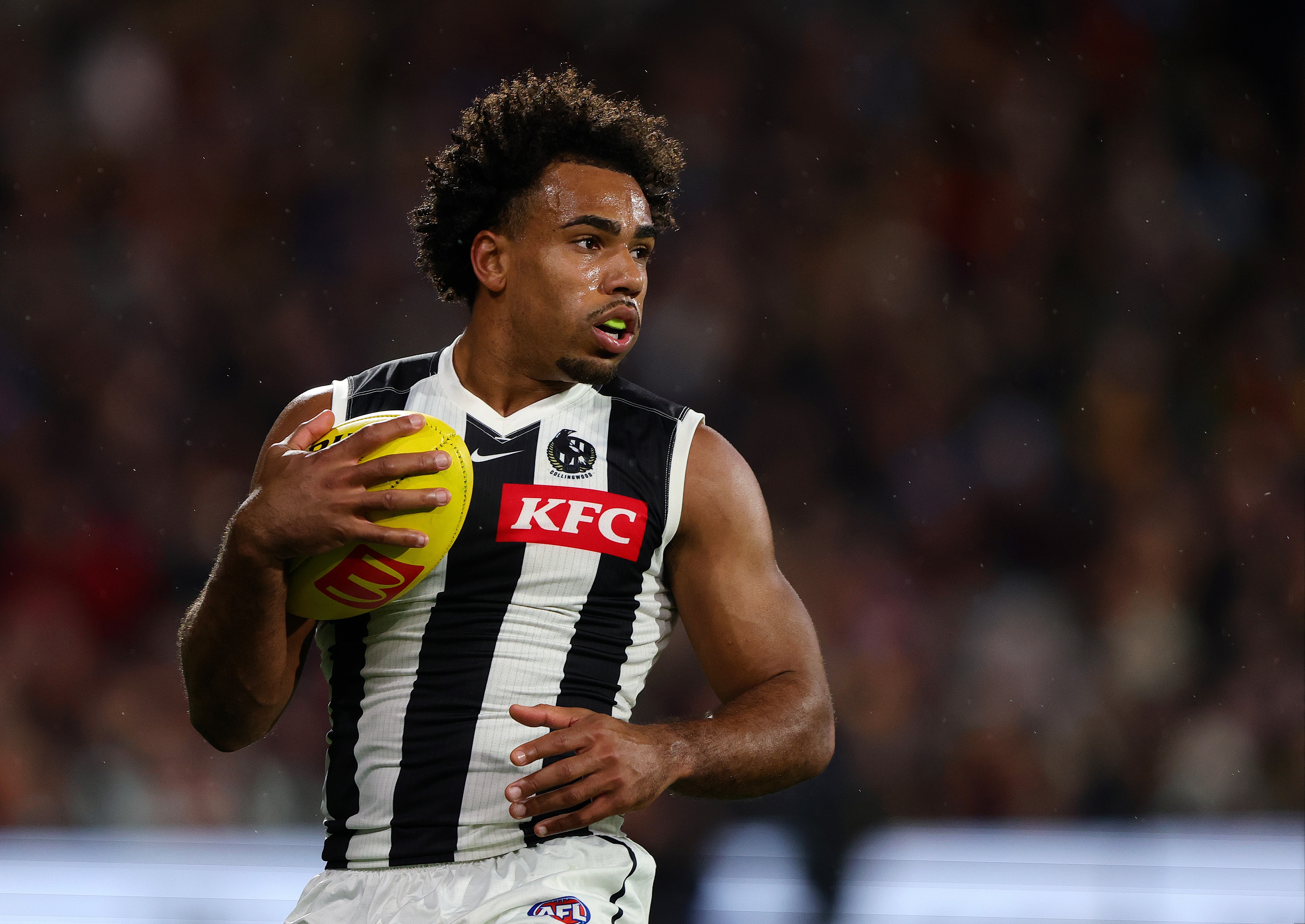 Brown slams Crows coach for his response to Quaynor booing