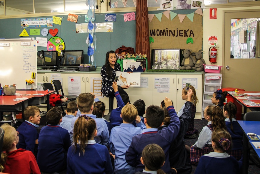 Grade 4 teacher, Melinda Whittle sitting at kangaroo corner complete with crocheted kangaroos.