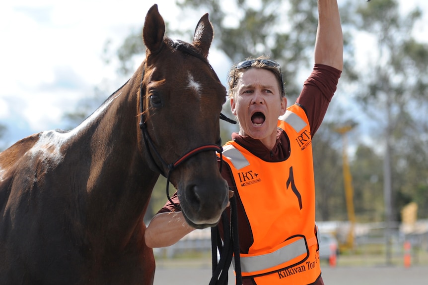 Brook Sample celebrates Tom Quilty win