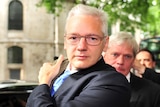 Assange arrives for extradition fight