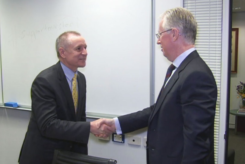 Premier Jay Weatherill shakes hand of Mark Mentha the Arrium administrator