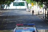 Police car sits in Brisbane floodwaters