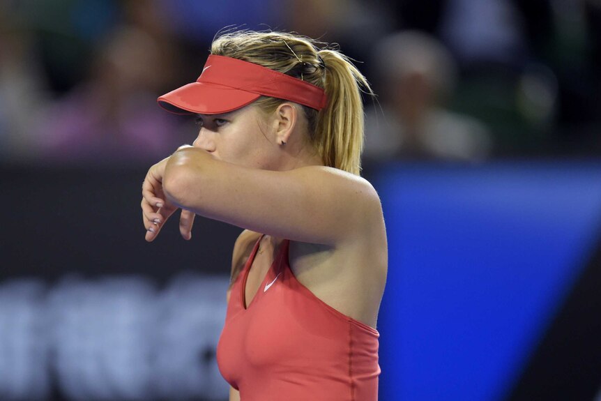 Tough night ... Maria Sharapova reacts after losing the first set