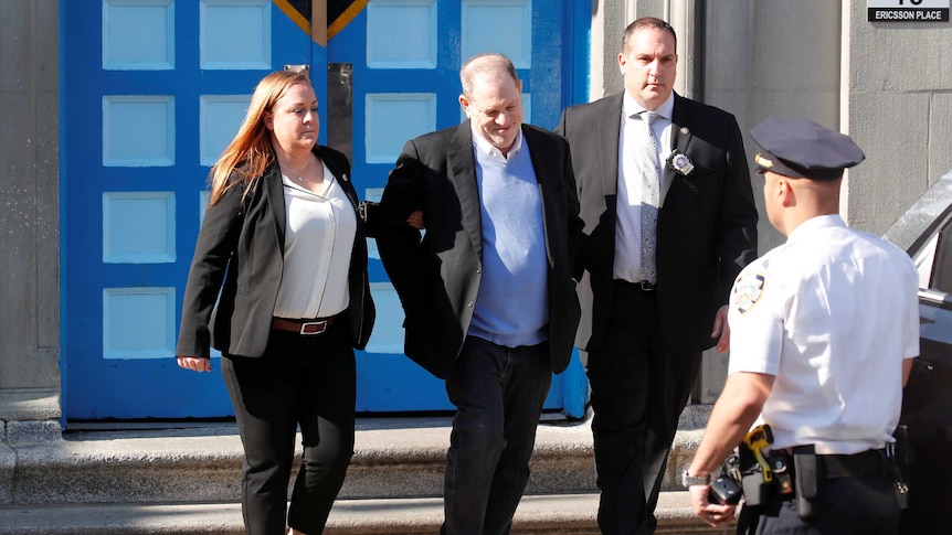 Film producer Harvey Weinstein leaves the 1st Precinct in Manhattan in handcuffs.