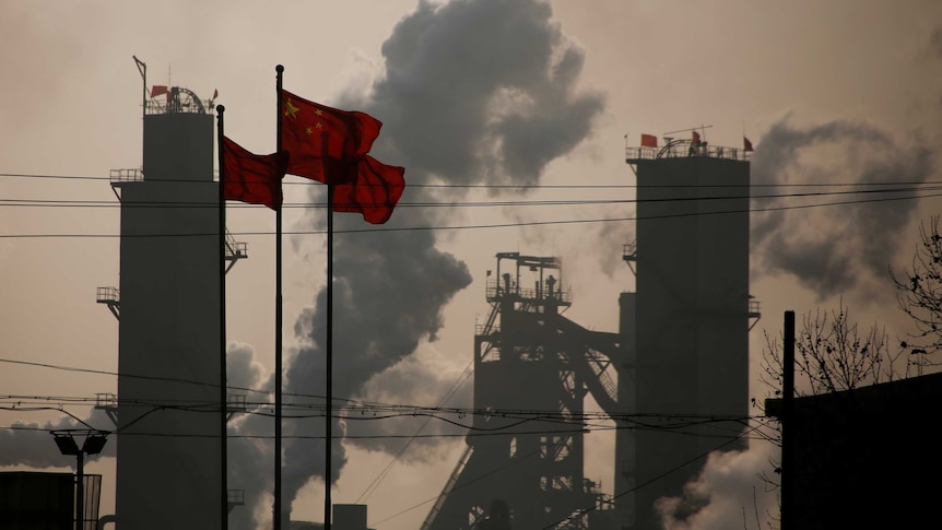 Chinese national flags are flying near a steel factory in Wu'an, Hebei province, China,