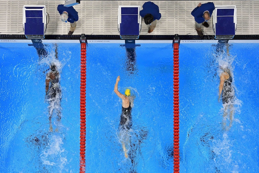 Simone Manuel of the United States touches the wall to win gold in the women's 100m freestyle final.