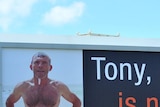 A billboard featuring Opposition Leader Tony Abbott