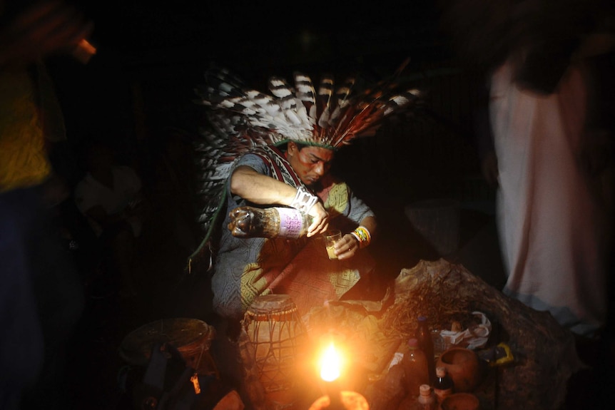 A Huni Kui Indian prepares Ayahuasca