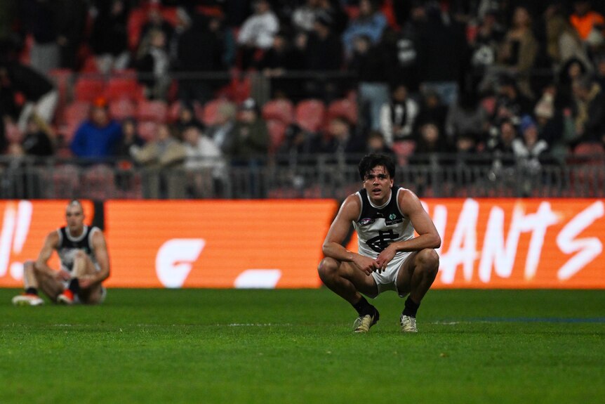 The Blues show their dejection after their loss to Giants.