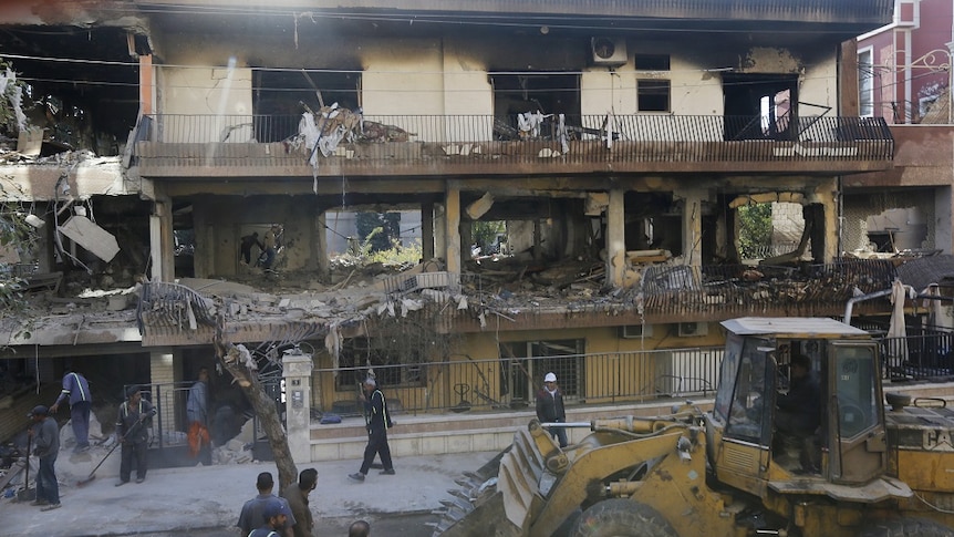 a destroyed house from a rocket attack in Damascus.