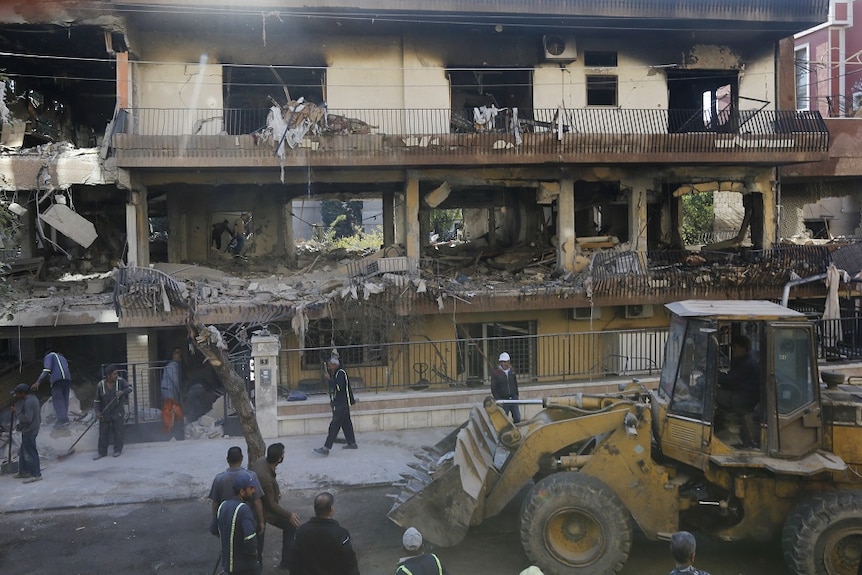 a destroyed house from a rocket attack in Damascus.