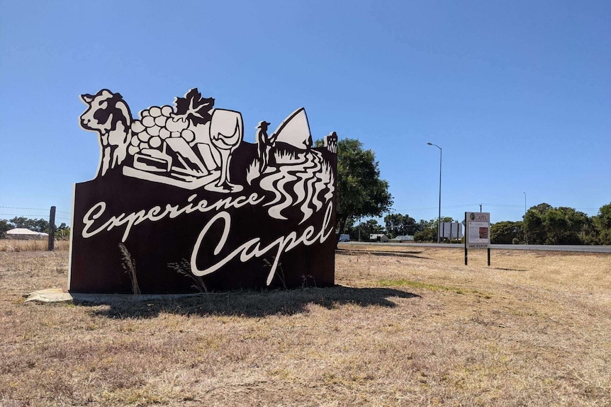 A town sign that reads "Experience Capel".