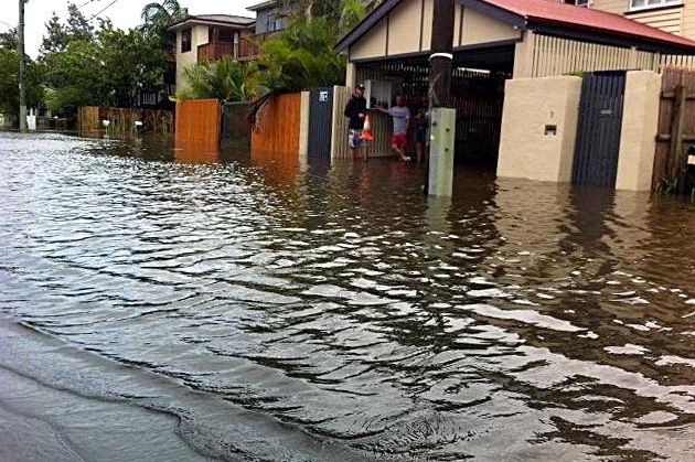 Floodwaters creep into Milton.