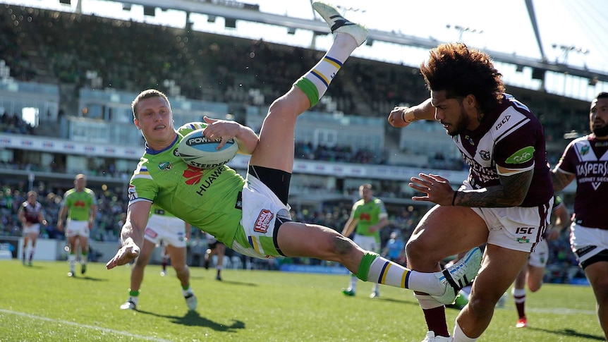 Jack Wighton is hit by Jorge Taufua