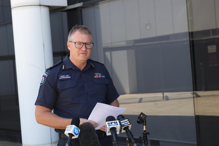 Darryl wears his official DFES uniform as he speaks at a press conference
