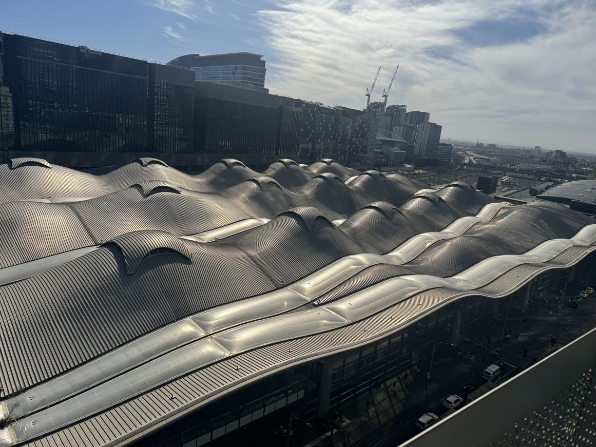 A wavy corrugated iron roof.
