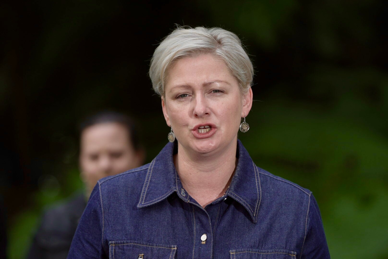 Amanda Camm speaks at a press conference.