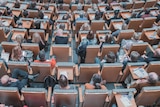 A group of students sitting in a lecture theatre