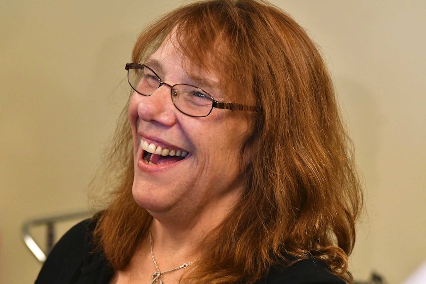 A close-up photo of Mavis Wanczyk smiling.