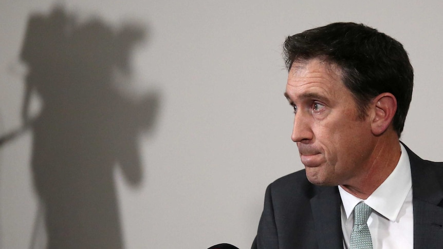 Cricket Australia chief executive James Sutherland looks on during a news conference