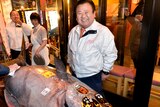 Sushi-Zanmai stands next to a 269 kilogram bluefin tuna he purchased for $US724,000.