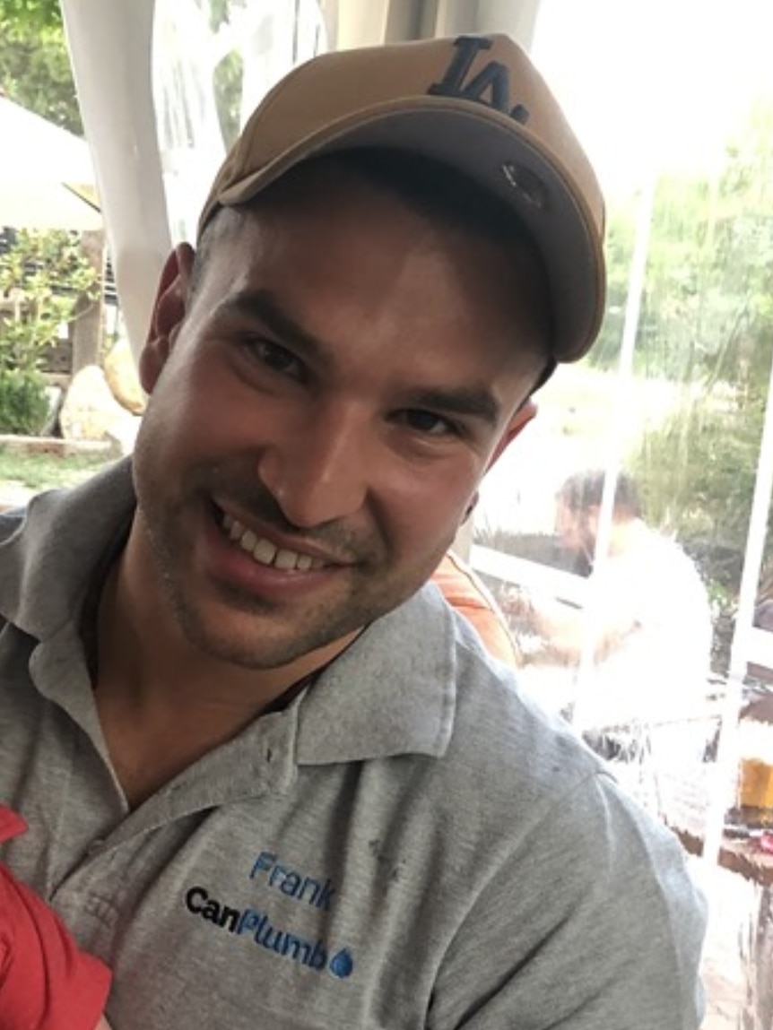 A man wearing a baseball cap, wearing a shirt which says CanPlumb.