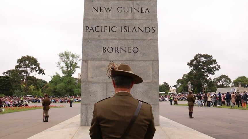 Soldiers stand to attention at the Remembrance Day ceremony in Melbourne, November 11, 2015.