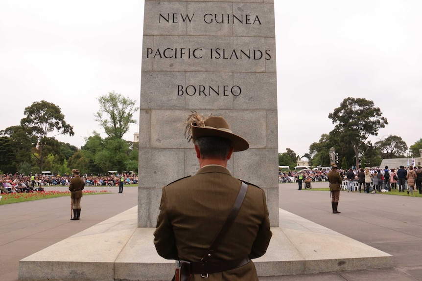 Soldiers stand to attention at the Remembrance Day ceremony in Melbourne, November 11, 2015.