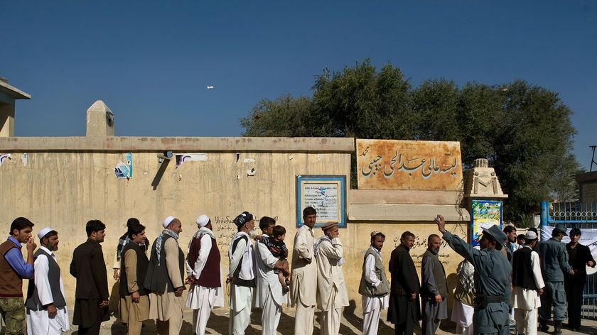 Voters queue outside Afghan polling station