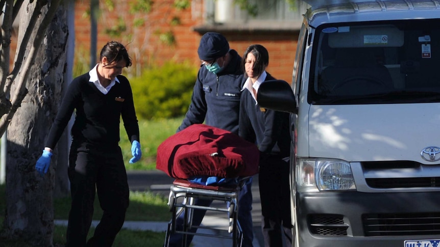 Police attend to a body found on Strang Street in Hoppers Crossing, Melbourne